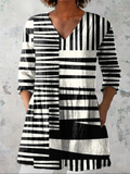 Aurora | Blusa Lunga a Righe Grafiche