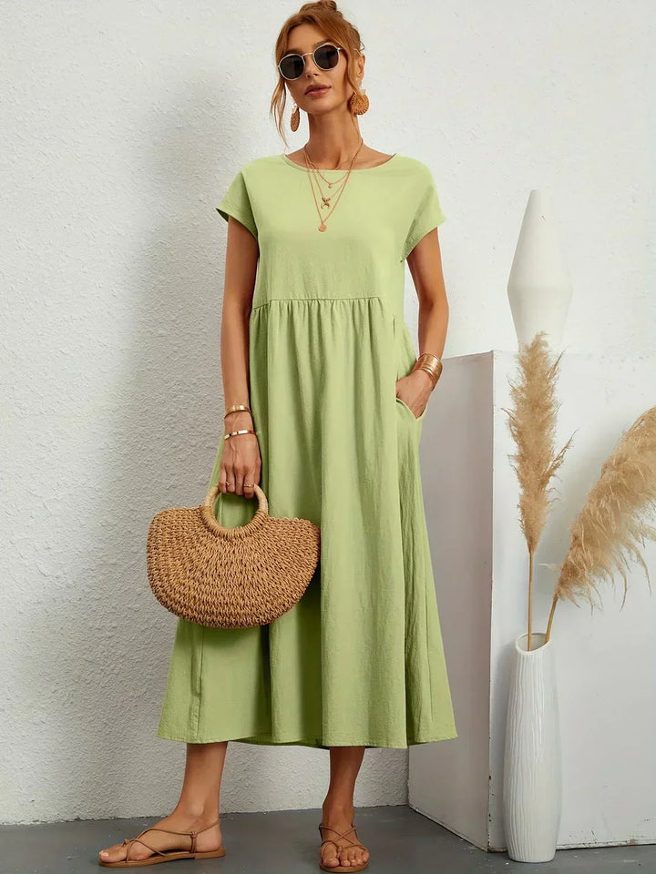 Livia | Abito Maxi Svasato con Tasche