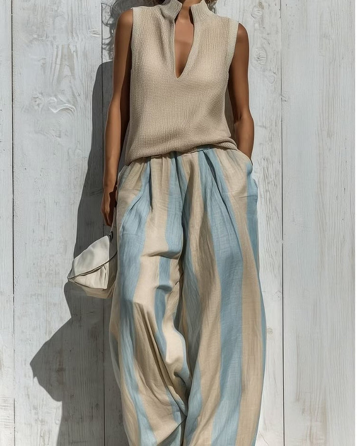 Alba completo Cachi — top smanicato beige e pantalone a righe verticali