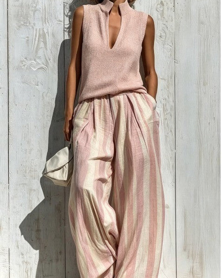 Alba completo Rosa — top smanicato rosa e pantalone a righe verticali