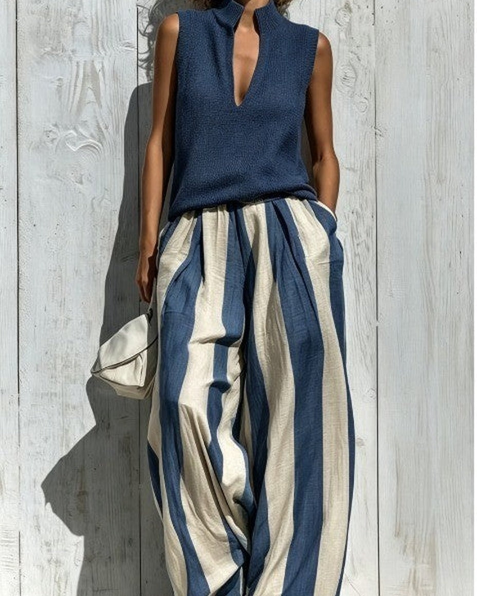 Alba completo Blu Navy — top smanicato blu e pantalone a righe verticali